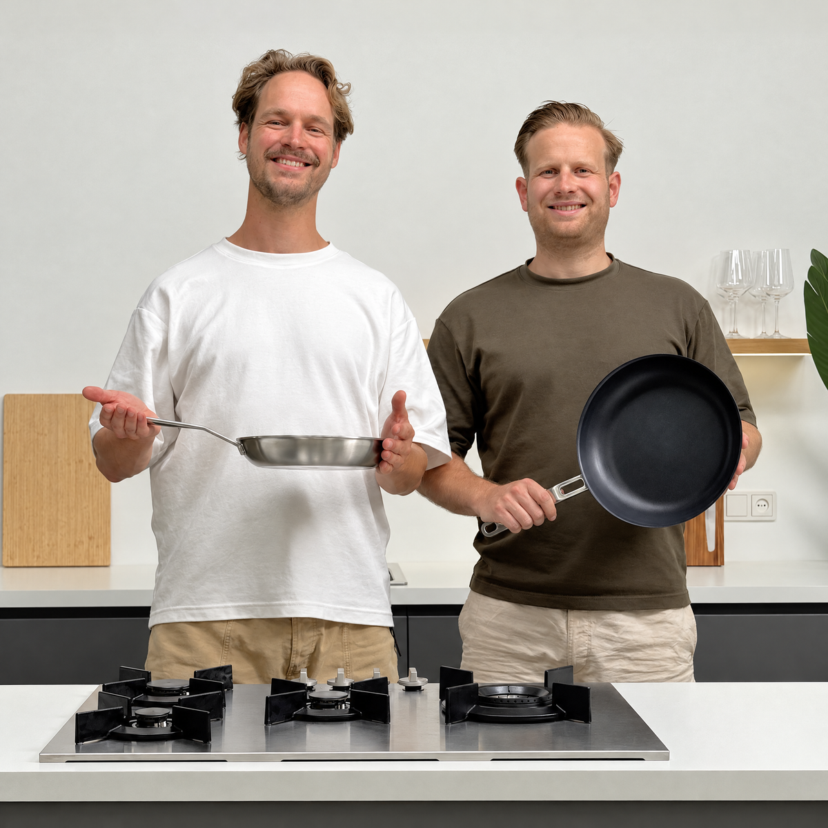 Two BARE Cookware founders holding a frying pan